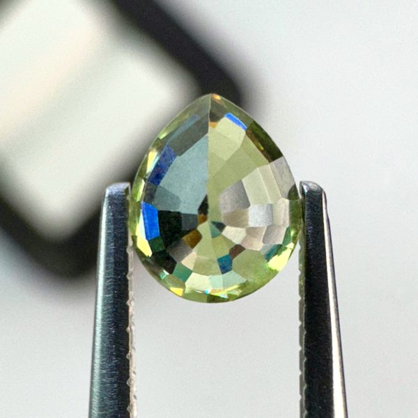 0.43 carat natural demantoid garnet from Namibia, Light bright green color, and beautiful clarity