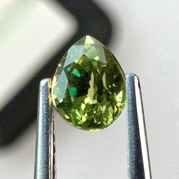 0.43 carat natural demantoid garnet from Namibia, Light bright green color, and beautiful clarity