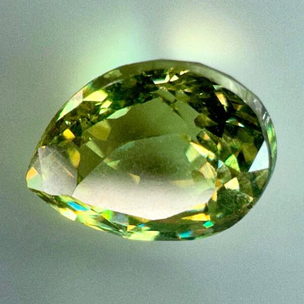 0.43 carat natural demantoid garnet from Namibia, Light bright green color, and beautiful clarity