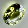 0.46 carat natural demantoid garnet from Namibia, bright green color, eye-clean clarity, and exceptional brilliance.