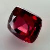 Natural cushion cut red spinel from Burma, exhibiting a rare raspberry color and excellent clarity, ideal for fine jewelry and gemstone collections.