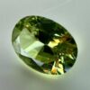 0.40 carat natural demantoid garnet from Namibia, very bright green color, oval cut, and untreated.