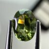0.40 carat natural demantoid garnet from Namibia, very bright green color, oval cut, and untreated.