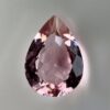 Pink tourmaline gemstone, 0.58 carat, pear-shaped cut, rare salmon pink color, beautiful clarity, and brilliant shine.